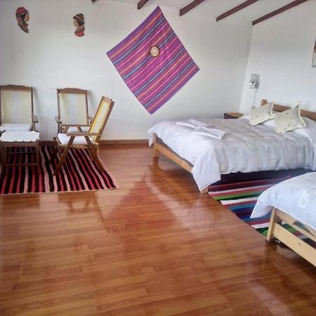 Hostal Inca Uma Comunidad Yumani Extérieur photo