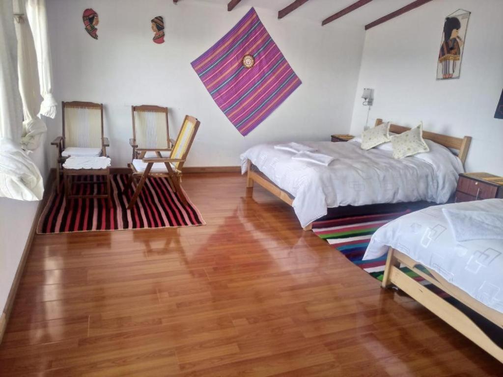 Hostal Inca Uma Comunidad Yumani Extérieur photo