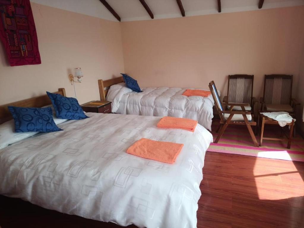 Hostal Inca Uma Comunidad Yumani Extérieur photo